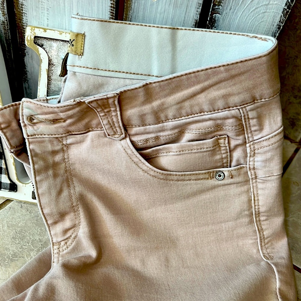 Democracy brand light khaki pants. Size 12 with an solution.